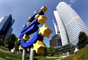 FILE - This is a Thursday, May 7, 2009, file photo of the euro sculpture seen in front of the European Central Bank in Frankfurt, central Germany. The European Central Bank has kept interest rates unchanged for the eighth month running as markets await comments from the bank's chief on Greece's financial crisis. . (AP Photo/Michael Probst, File) Europe Interest Rates